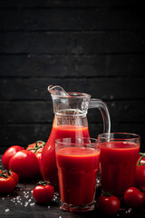 Fresh tomato juice in a jug. 