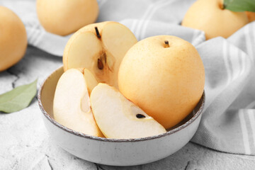 Naklejka na ściany i meble Delicious apple pears on white textured table