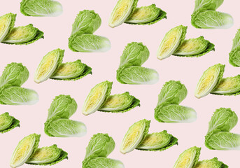 Pattern design with fresh Chinese cabbages on pale light pink background