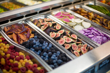 White Sierra Figs with Other Fruits and Vegetables at a Salad Bar