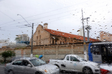 View, from windshield by car, of city on rainy day. Sao Paulo, Brazil