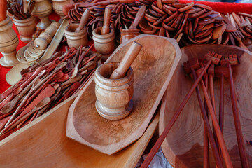 Wooden pestle in reddish tone for sale in a street market in downtown Sao Paulo, Brazil