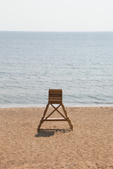 Lonely wood lifeguard tower on the beach