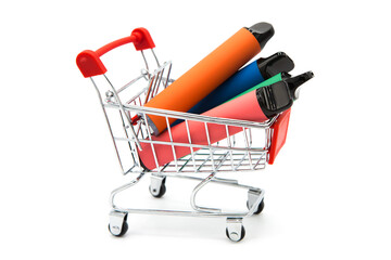 Set of colorful disposable electronic cigarettes in supermarket grocery shopping cart isolated on...