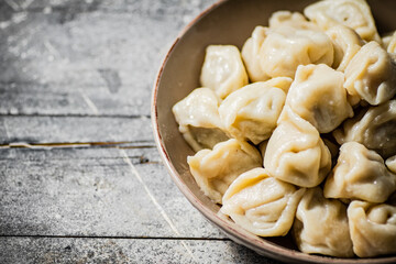 Boiled homemade dumplings on a plate. 