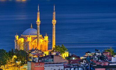 Istanbul. Night city view, Ortakoy Mosque and Bosphorus on the Sunset