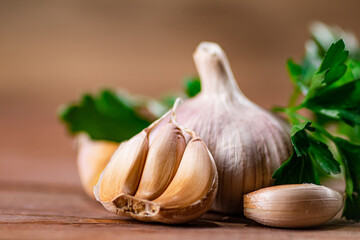 Cloves of fresh garlic with parsley. 