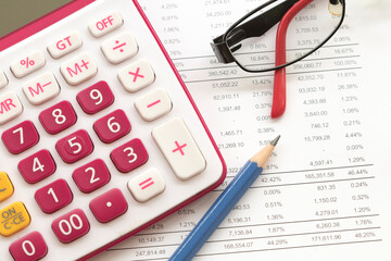 calculator, statement balance sheet accounting for business work with spectacles arrangement flat lay style on background white 