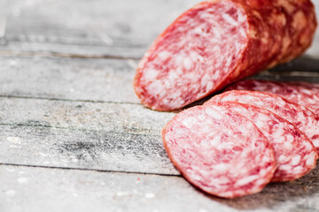 Delicious salami sausage on the table. 