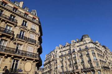 Fototapeta na wymiar typical haussmannian facade , parisian ornamented building real estate property