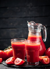 Tomato juice on a stone board. 