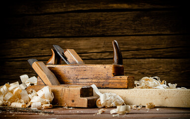 Working tool. Planer with wooden shavings. 