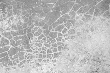 Grunge concrete wall with cracks in an industrial building Suitable for your designs and work surfaces.
