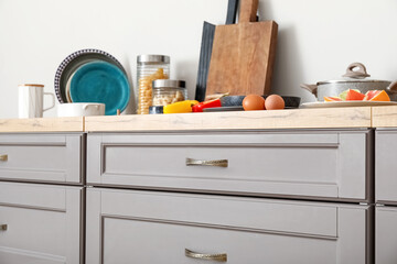 Grey counters with drawers in modern kitchen, closeup