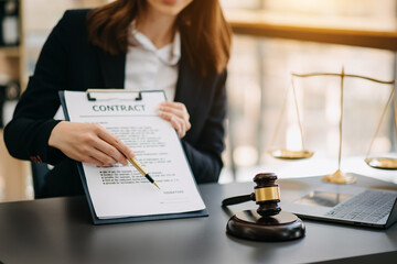 justice and law concept.Male judge in a courtroom on wooden table and Counselor or Male lawyer working in office.