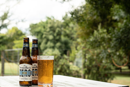 Ice-cold alcohol-free zero alcohol bottles of James Squire 0.0 beer with glass full and condensation on a hot summers day in Victoria Australia 21 January 2023 illustrative editorial content