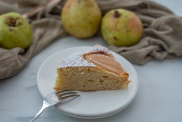 sweet home made pear almond pie on a table