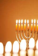 Golden Hanukkah Candles Lit for the Eighth Night of Hanukkah 