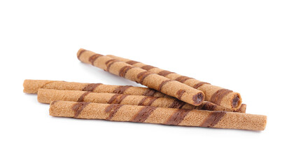 Tasty wafer rolls with chocolate isolated on white background