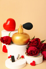 Podiums with perfume, jewelry, hearts and roses for Valentine's day on beige background