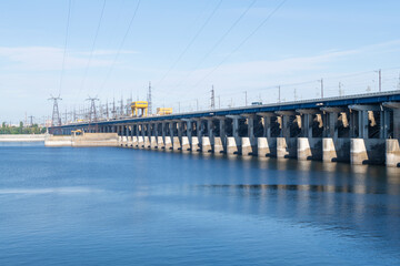 Fototapeta na wymiar View of the Volga hydroelectric dam on a sunny day. Volgograd, Russia