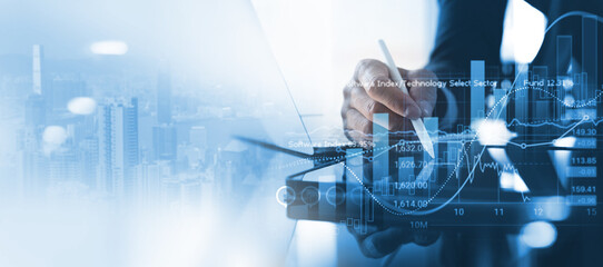 Businessman, finance analyst calculating and analyzing financial data with economic graph growth chart, stock market report, finance, banking and investment, business plan, strategy and solution