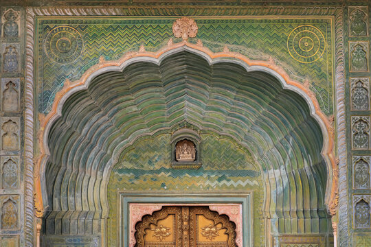 Historic ornate door architecture of City Palace in Jaipur, Rajasthan, India