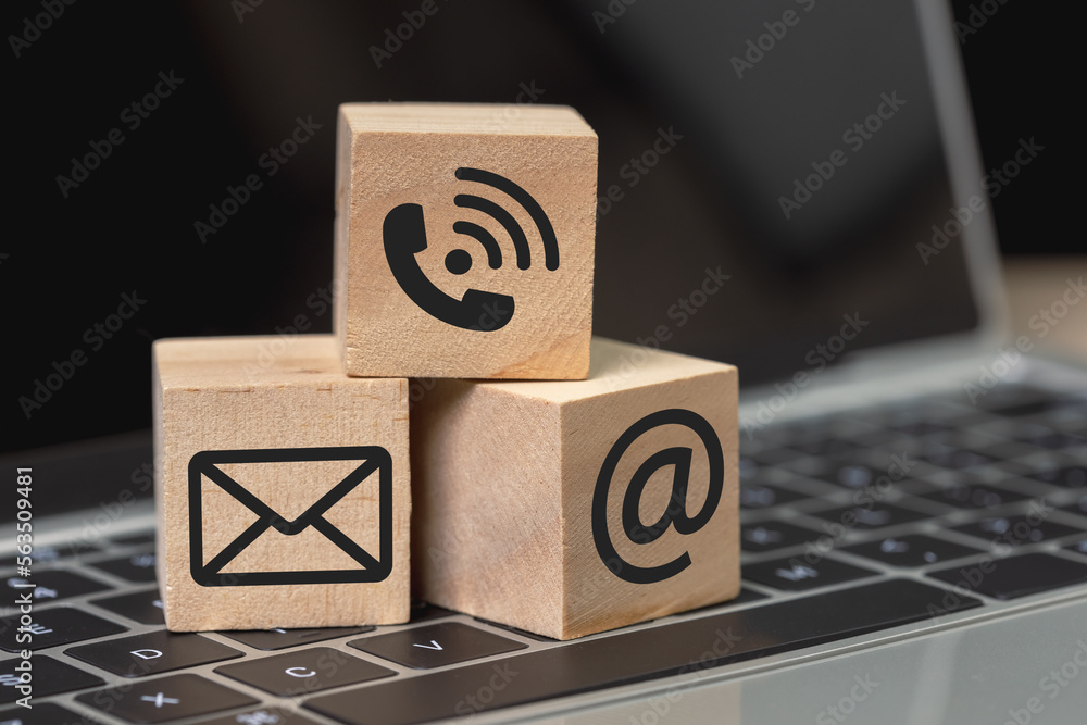 Canvas Prints concept of contact us. wooden cube blocks with contact icons on computer keyboard. symbol of connect