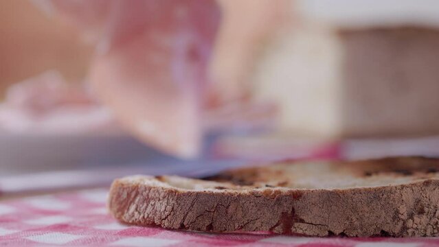 Slice of mortadella on bread