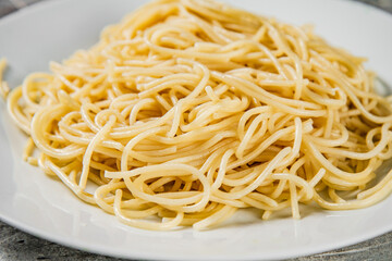 Boiled spaghetti on a plate. 