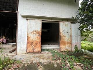 old wooden door of abandon factory 