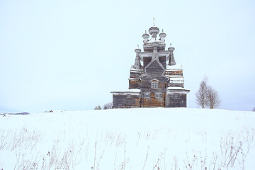 wooden church in the Russian north landscape in winter, architecture historical religion Christianity