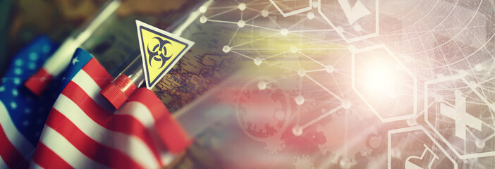 American flag, test tubes and biohazard sign. The concept of American biolabs and research centers.