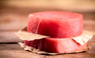 Fresh raw tuna steak on the table. 