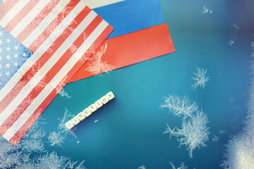 American and Russian flag. US sanctions against Russia. Aggravation and freezing of diplomatic...