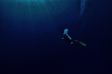 diver scuba depth blue lonely