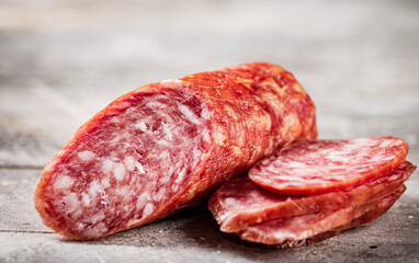 Delicious salami sausage on the table. 