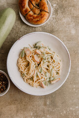 Pasta with zucchini. Homemade spaghetti with vegetables and sausage.