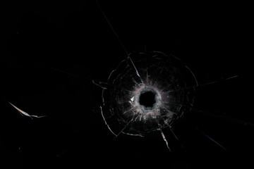 bullet hole on glass black background for overlay, transparent window