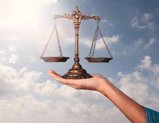 Plates in the balance. Concept of finance and justice law
