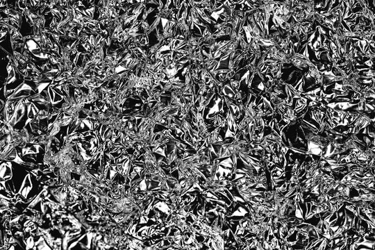 crumpled foil abstract background black and white silver effect