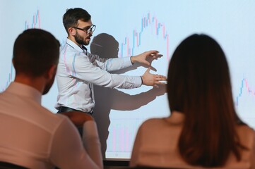 Obraz premium Analyzing data, graphs and reports for investment purposes. Creative teamwork traders.