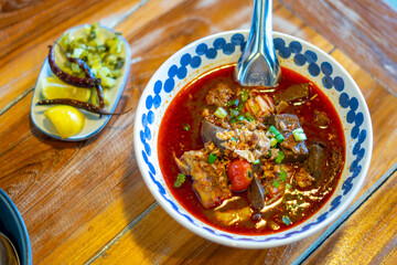 Rice noodles with spicy pork sauce. Local food of Thai in the north of Thailand