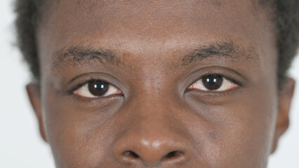 Close Up of Young African Man Blinking Eyes