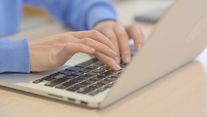 Close up of Woman Typing on Laptop
