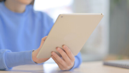 Close up of Woman using Tablet, Browsing Internet