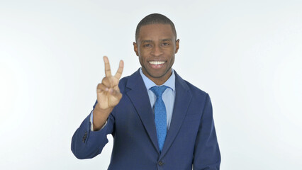 African Businessman with Victory Sign on White Background