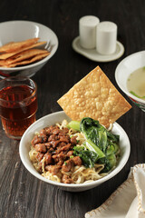 Mie Ayam, Chicken Noodle with Crispy Dumpling Cracker and Clear Broth