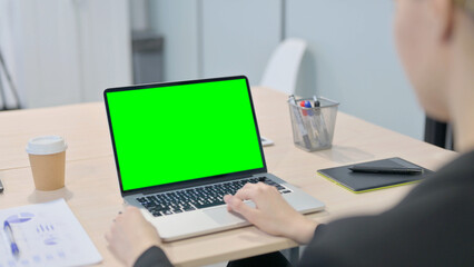 Businesswoman Using Laptop with Green Screen