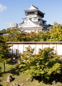 Kitakyushu, Japan - October 29, 2016: View of Kokura castle from a traditional Japanese garden nearby